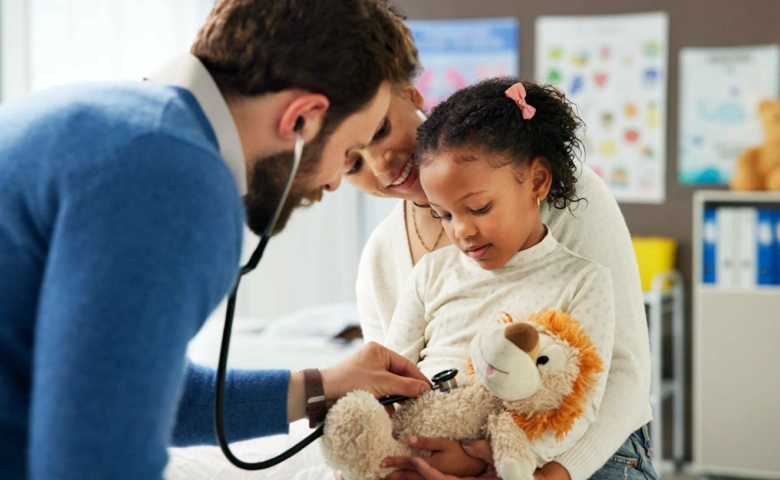 dr checking out a child